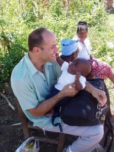 People Who Care: Dr. Cary Rasof - People Who Care: Dr. Cary Rasof - cuddling a baby in Zambia