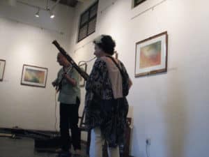 Musicians opening up an art exhibit at the Tibetan Pavilion