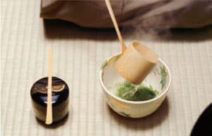 china-tea-crockery Image tea being poured into a cup