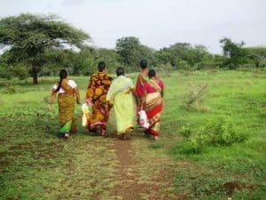 Women in India walking in colourful garments - The world that is there for us