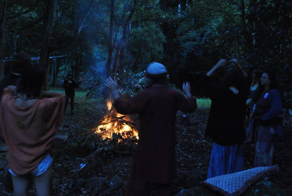 people around a fire
