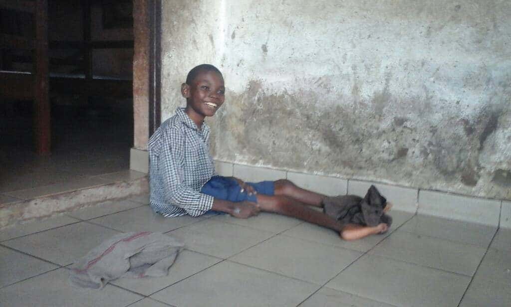 young disabled boy with a big smile