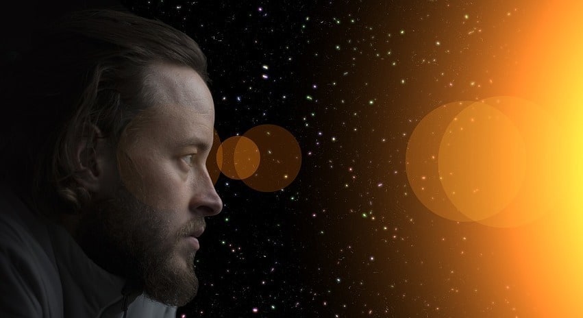 face looking into a glow