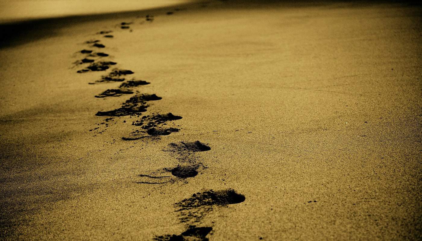 footsteps in sand