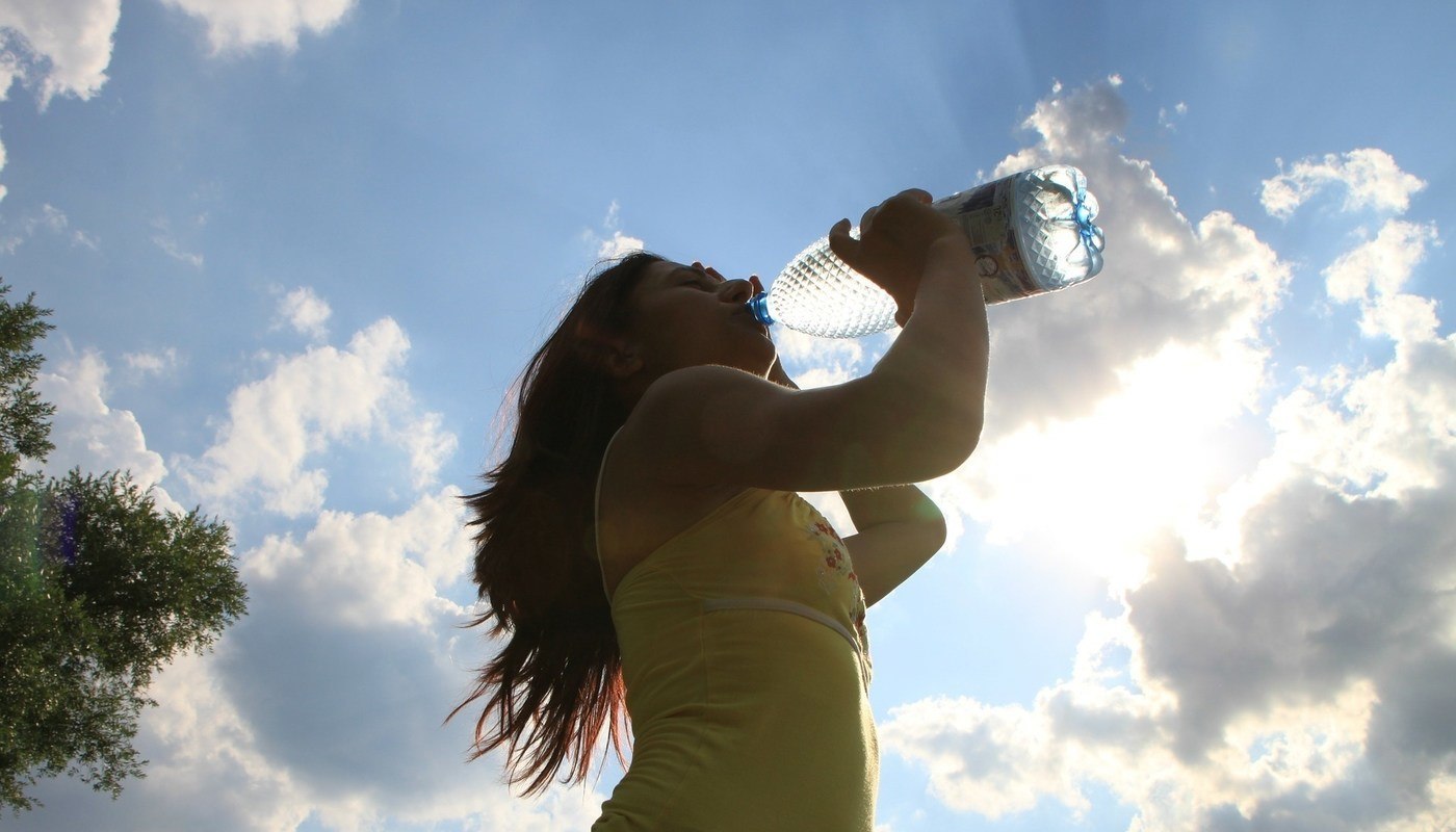 Girl drinking bottle of water