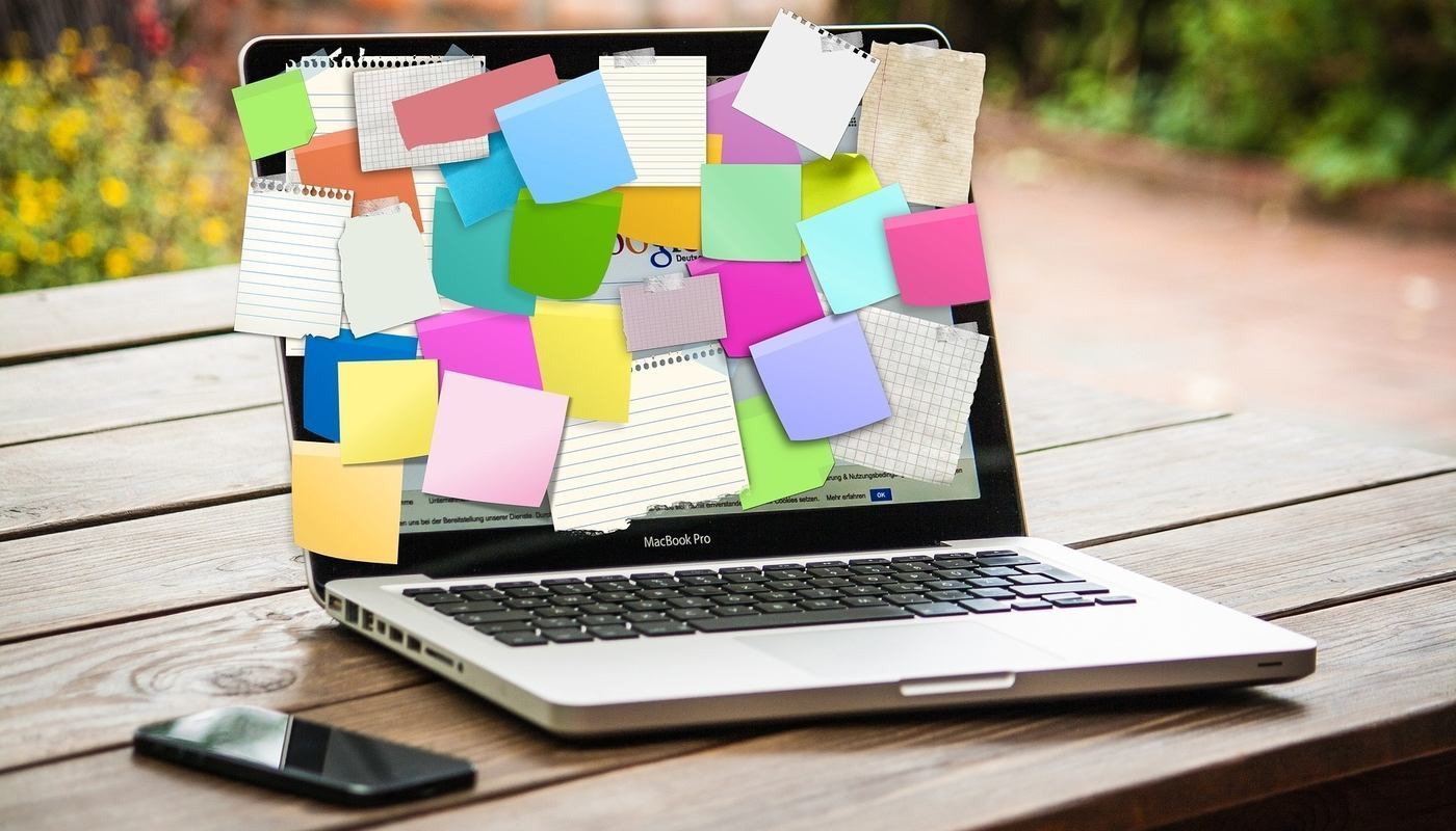 laptop with sticky notes