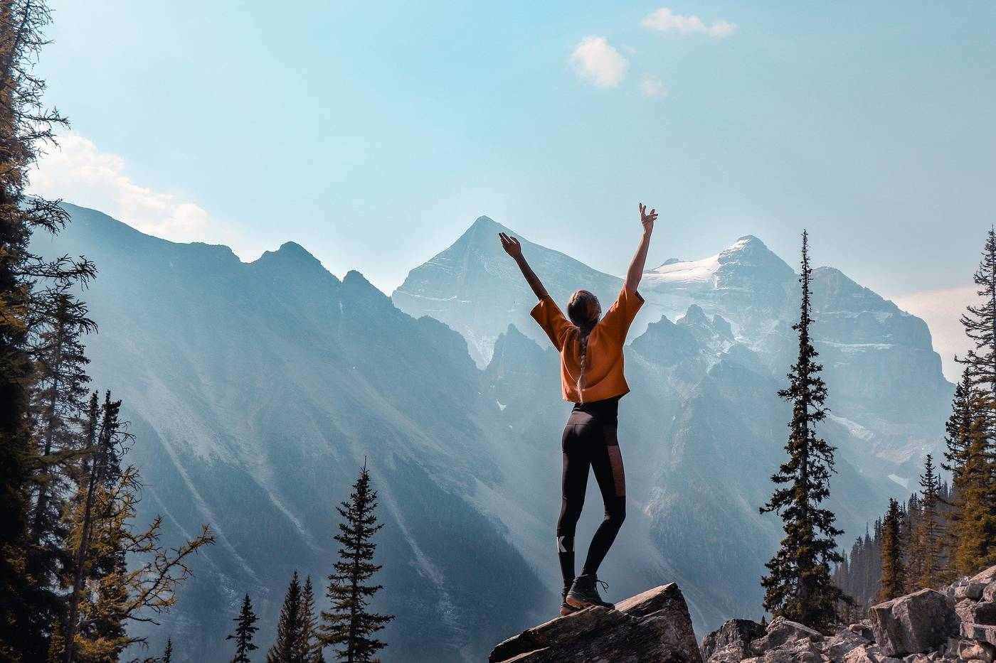 Woman standing on mountain